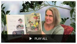 screenshot of woman reading a picture book on youtube