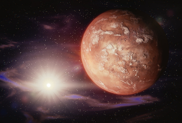 outer space scene - mars in the foreground on the right, sun in the background on the left